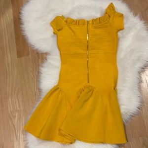 Bebe yellow mustard ruffles dress. Back zipper.